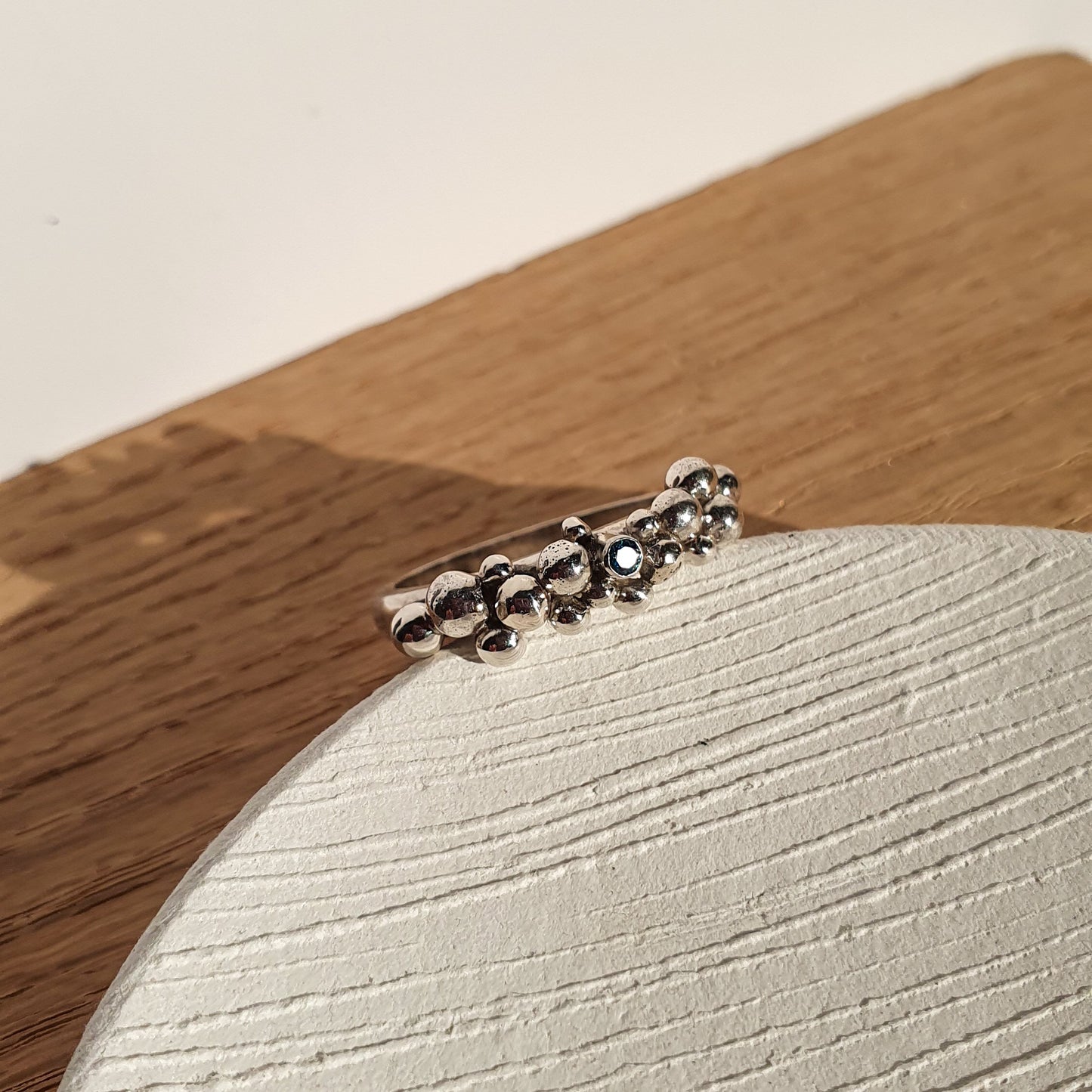 Bubble ring with 2mm CZ London Blue