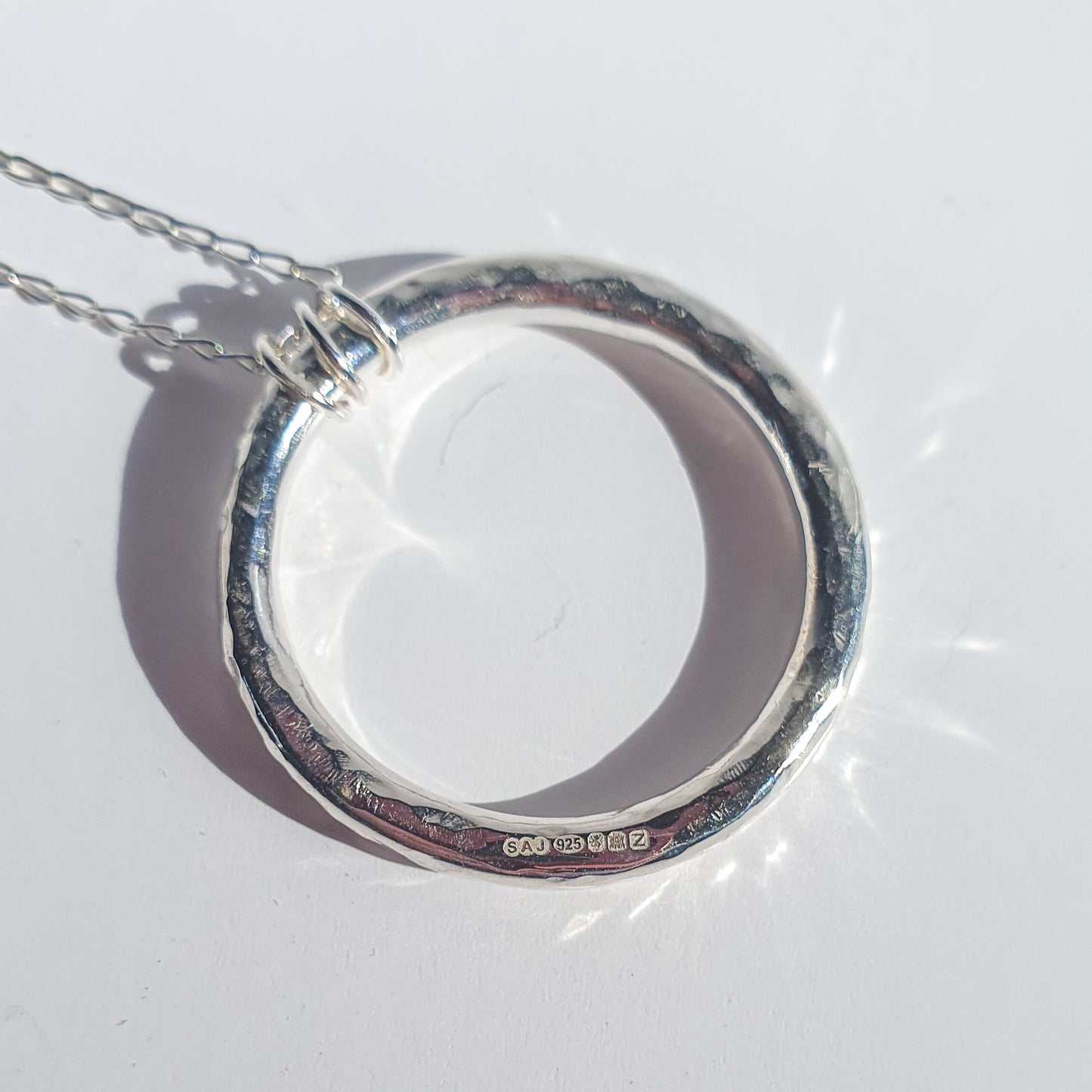 Hammered chunky circle pendant