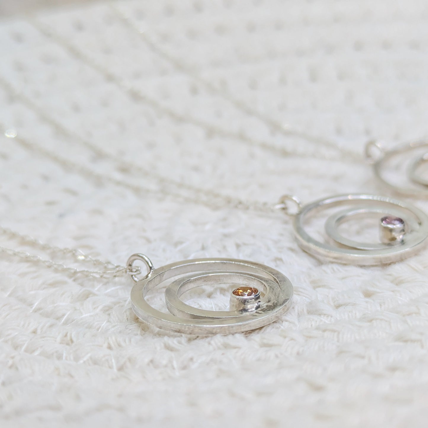 Double ring pendant with 3mm tube set Champagne Cubic Zirconia