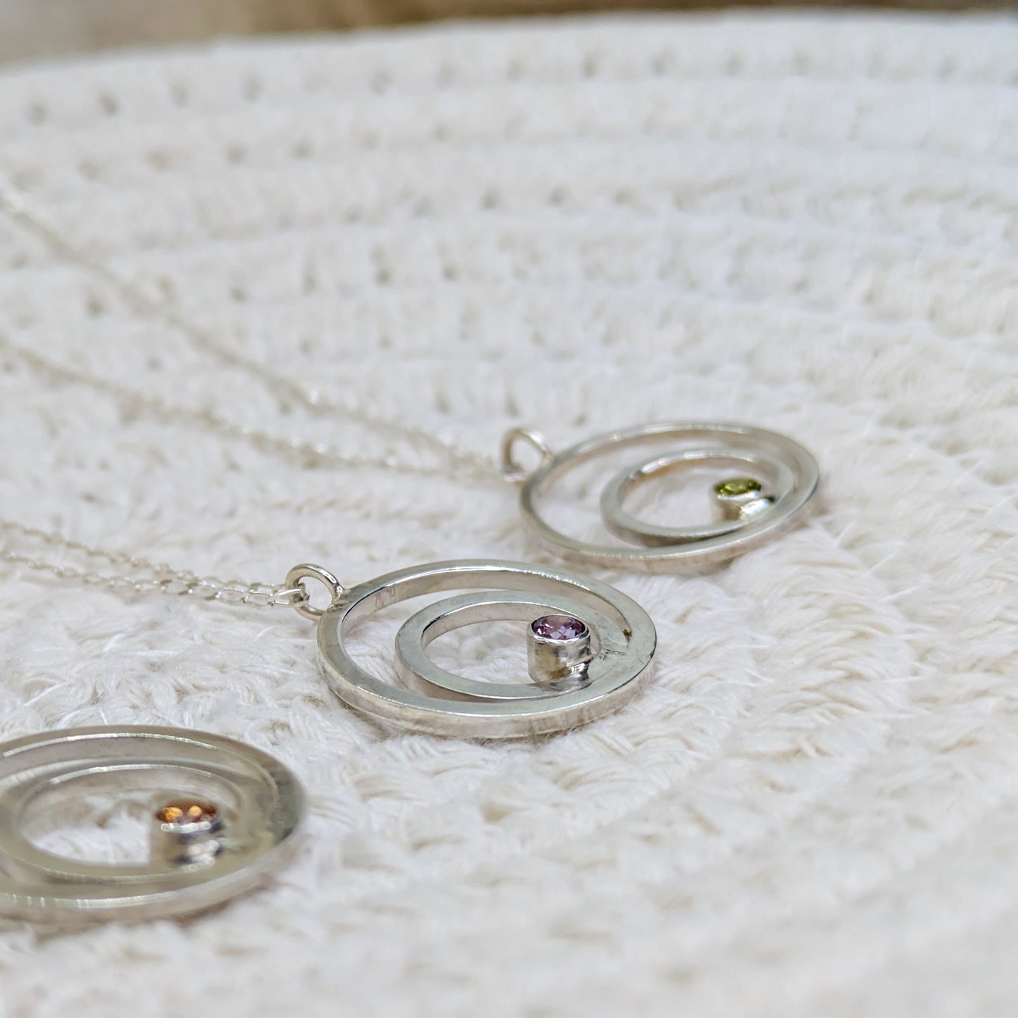 Double ring pendant with 3mm tube set Green Cubic Zirconia