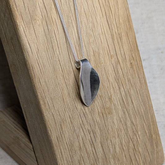 Polished petal pendant