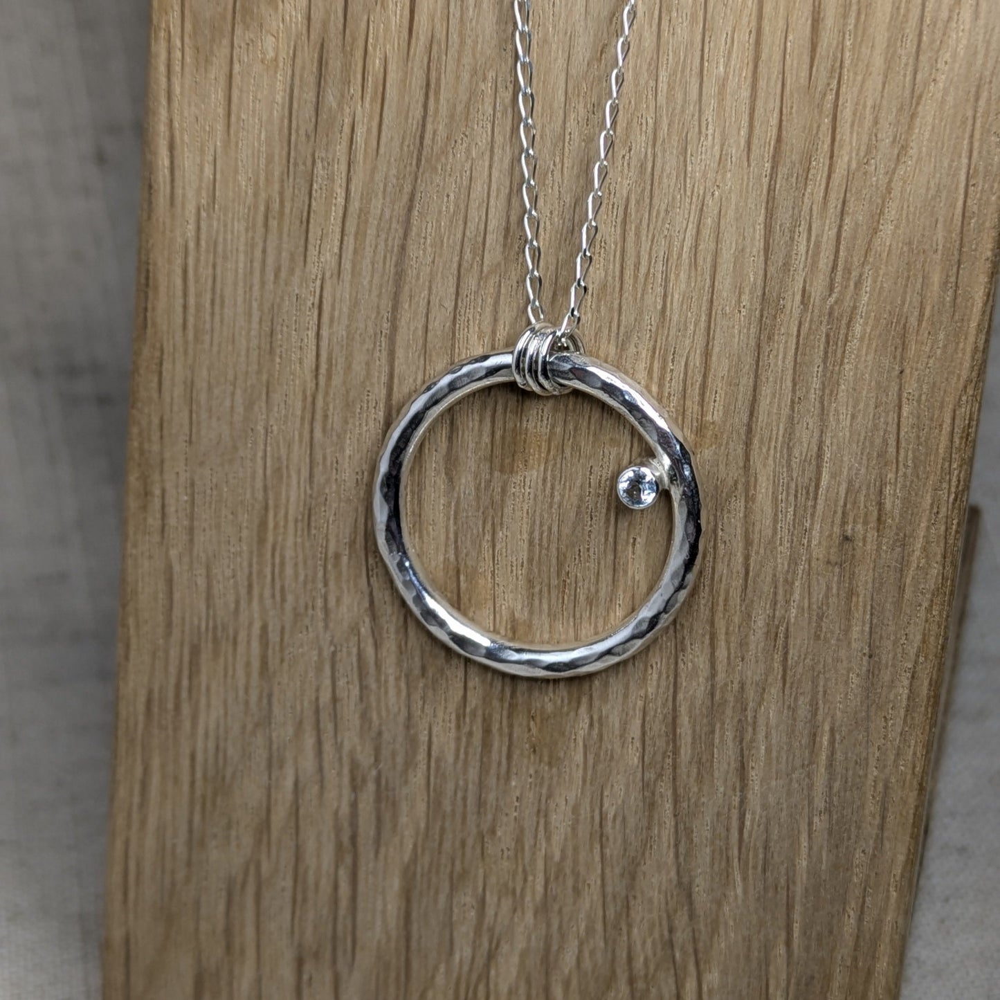 Chunky Circle Pendant with a 2.5mm Tube Set Aquamarine