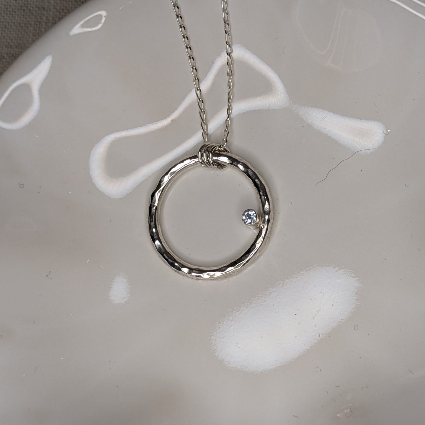 Chunky Circle Pendant with a 2.5mm Tube Set Aquamarine