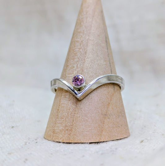 Sterling silver wishbone ring with a 3mm tube set pink Cubic Zirconia